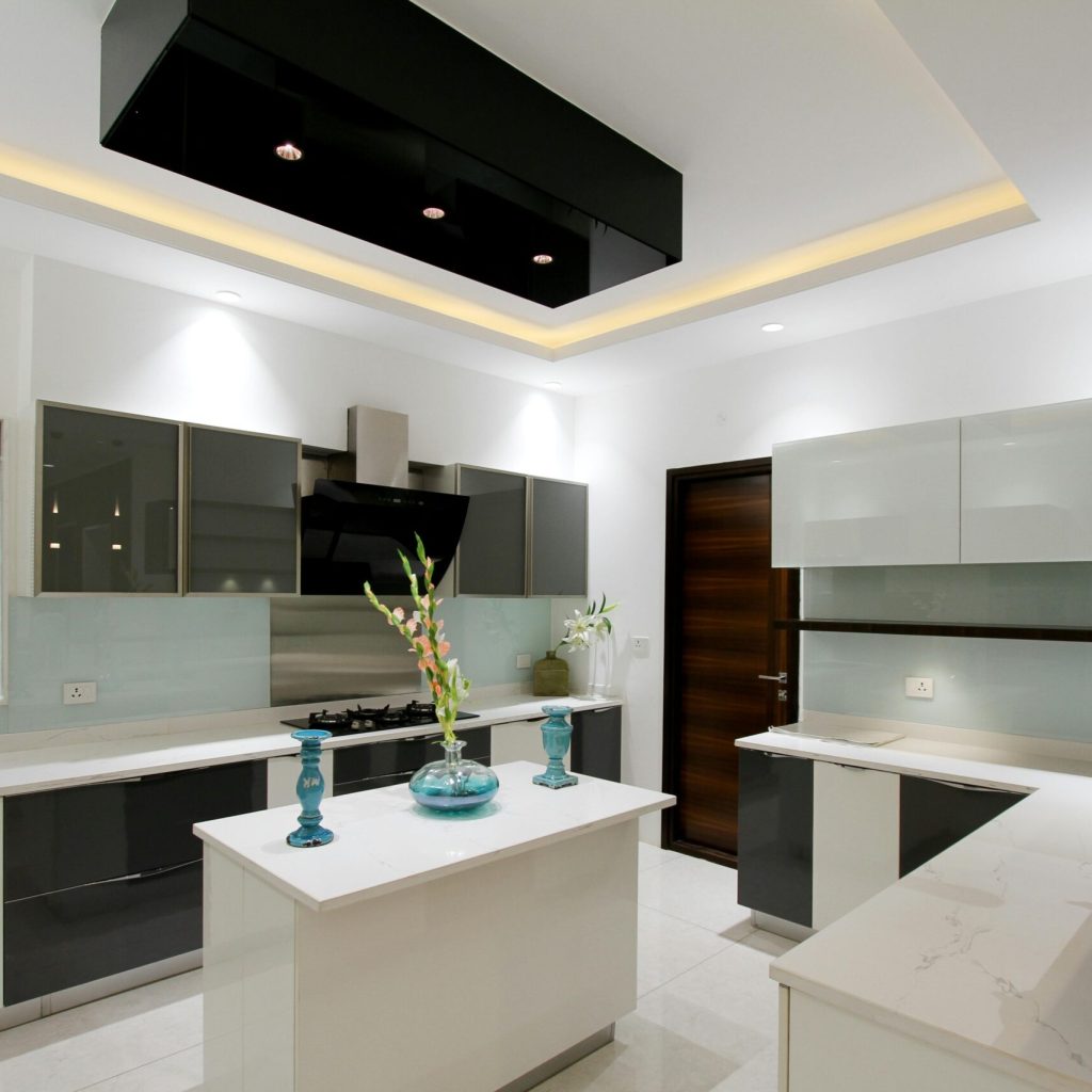 Explore a sleek and modern kitchen interior showcasing minimalist design and elegance in Hyderabad.